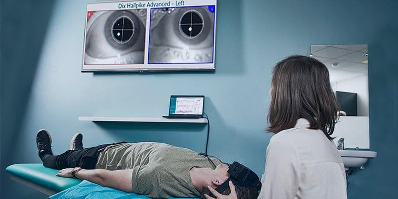 man being adjusted with dix hallpike